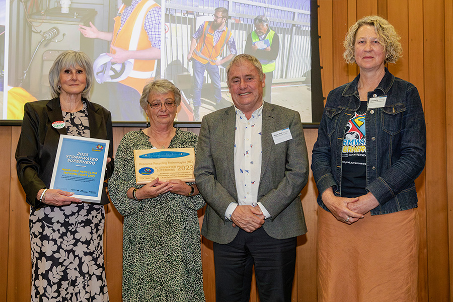 <p>Resource Recycling accepts their award from Christchurch Mayor Phil Mauger and zone committee Chair Annabelle Hasselman.</p>
